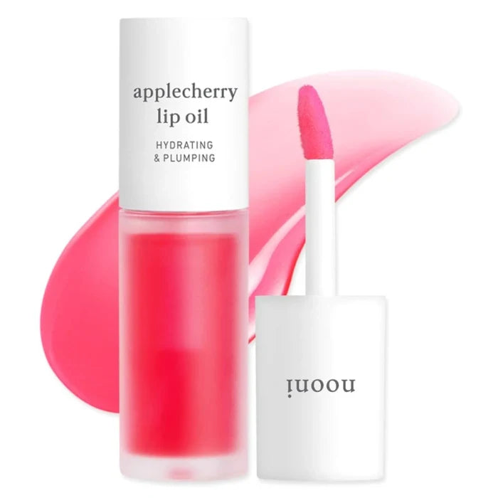 Nooni Applecherry Lip Oil – Produktfoto mit Applikator, pflegendes Lippenöl für weiche, glänzende Lippen, erhältlich bei Chic & Glow.